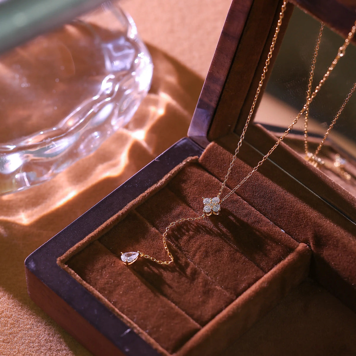 14K gold plated sterling silver Y-necklace with flower crystal connector and drop chain.