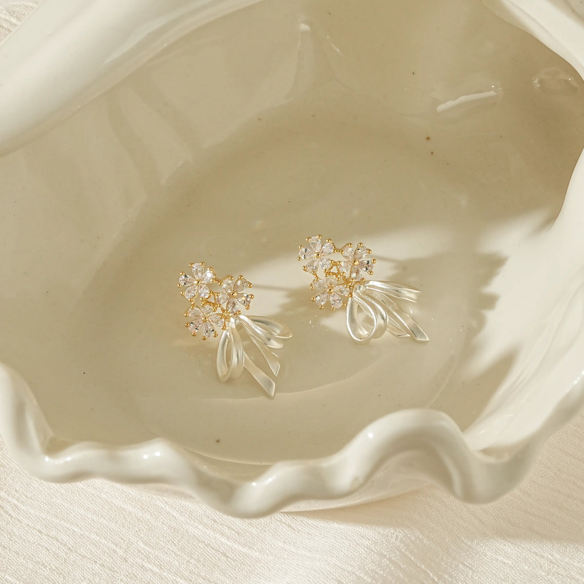Floral CZ Bow Drop Earrings – Clip-On or Stud