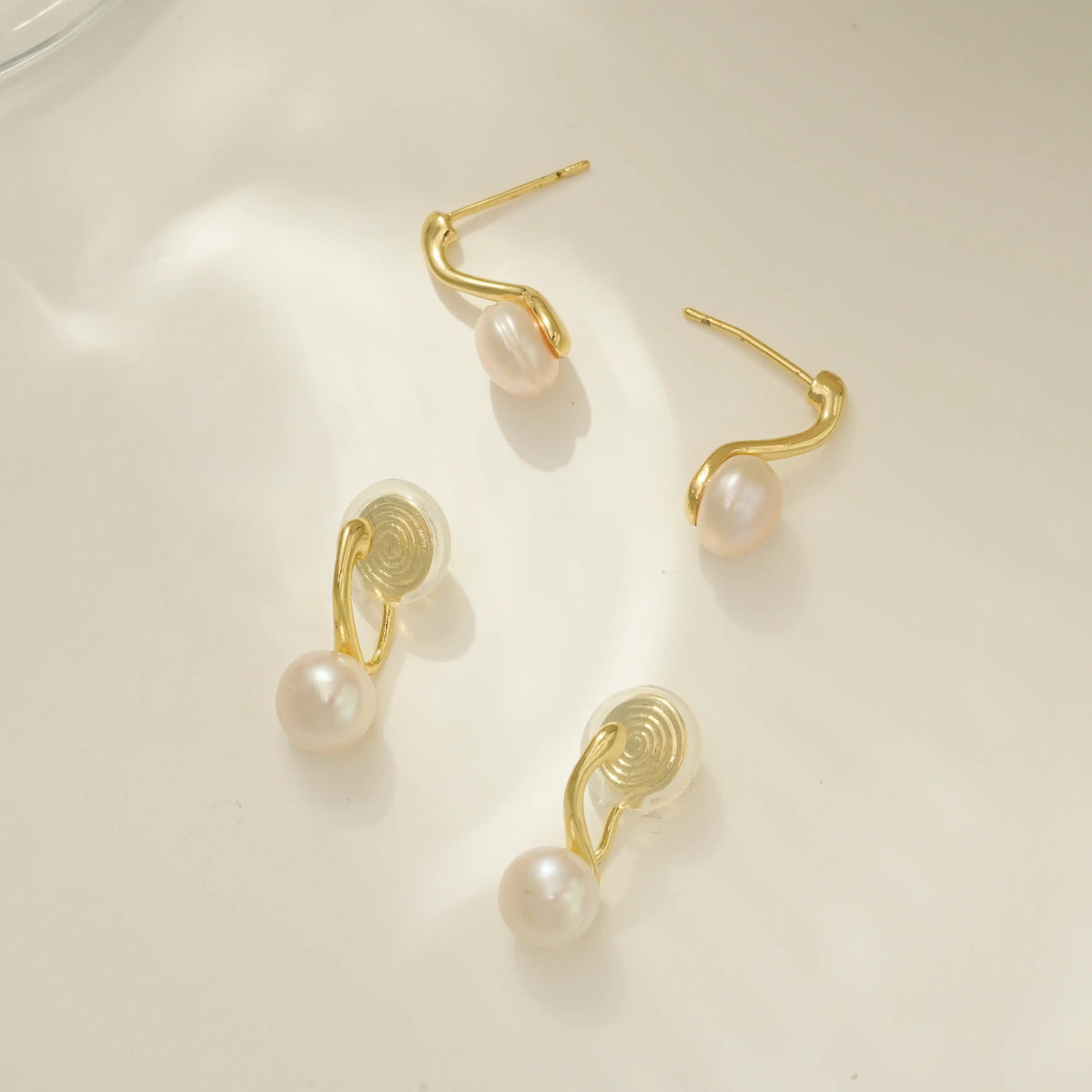 gold dainty pearl earrings available in clip on for non pierced ears and stud option pierced ears