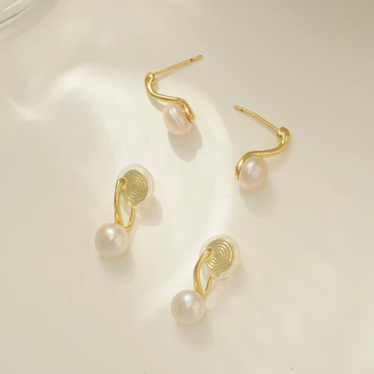 gold dainty pearl earrings available in clip on for non pierced ears and stud option pierced ears