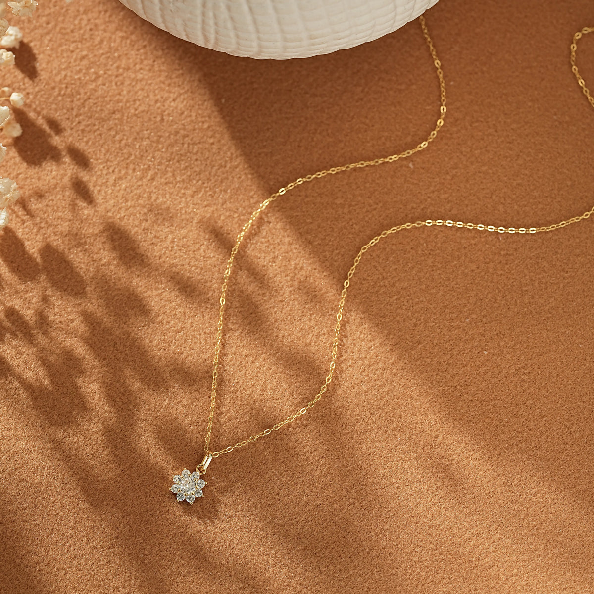 Extreme close-up of the pave setting and Cubic Zirconia stones on the snowflake pendant.