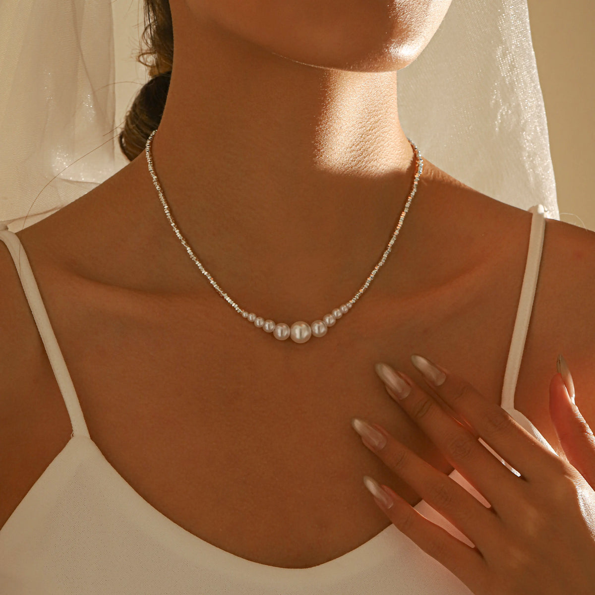 Silver pearl bead necklace worn as minimalist bridal jewellery